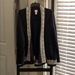 Black jacket with white detailing.